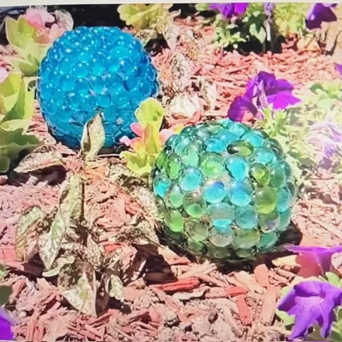 Round orbs with glass beads.
