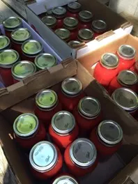 An image of  multiple jars of perserved food.