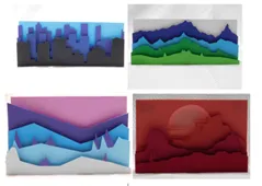 Landscapes created out of cardstock in different colors.