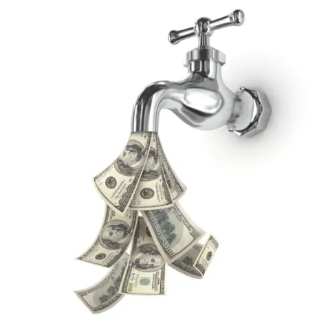 money flowing out of a water tap