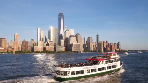 circle line boat in front of New York City skyline