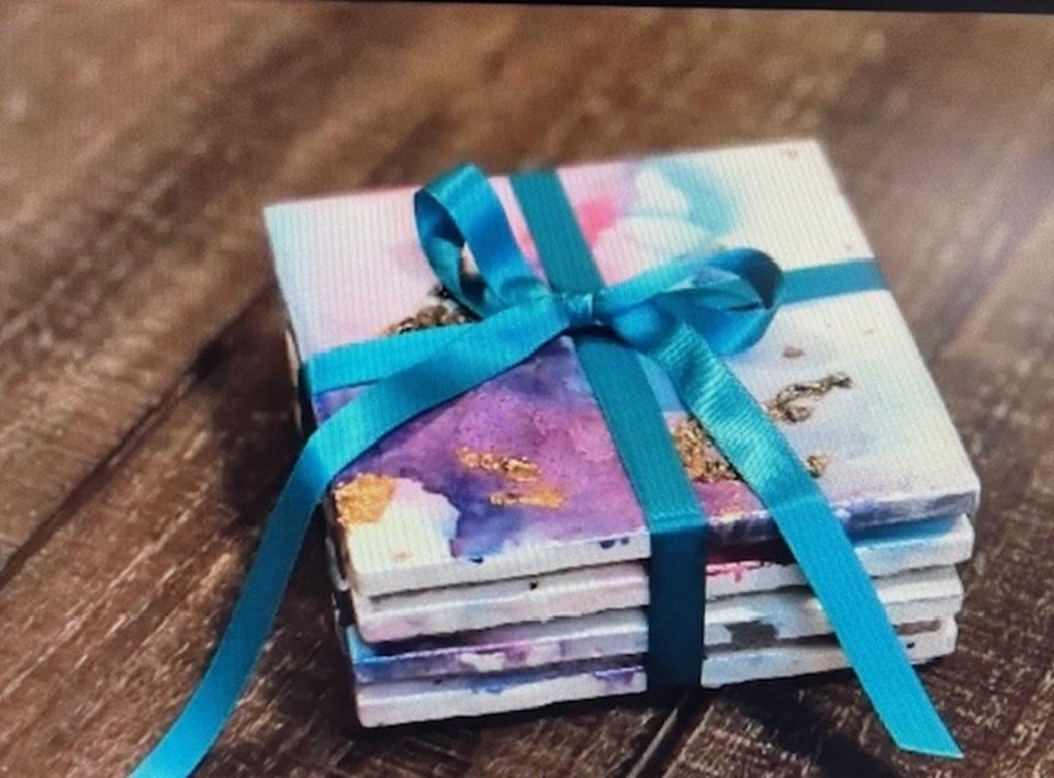 coasters painted with colorful india ink