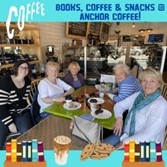 picture of group of people at Anchor Coffee around a table