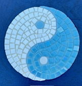 Ying-yang symbol made with two different shades of blue.